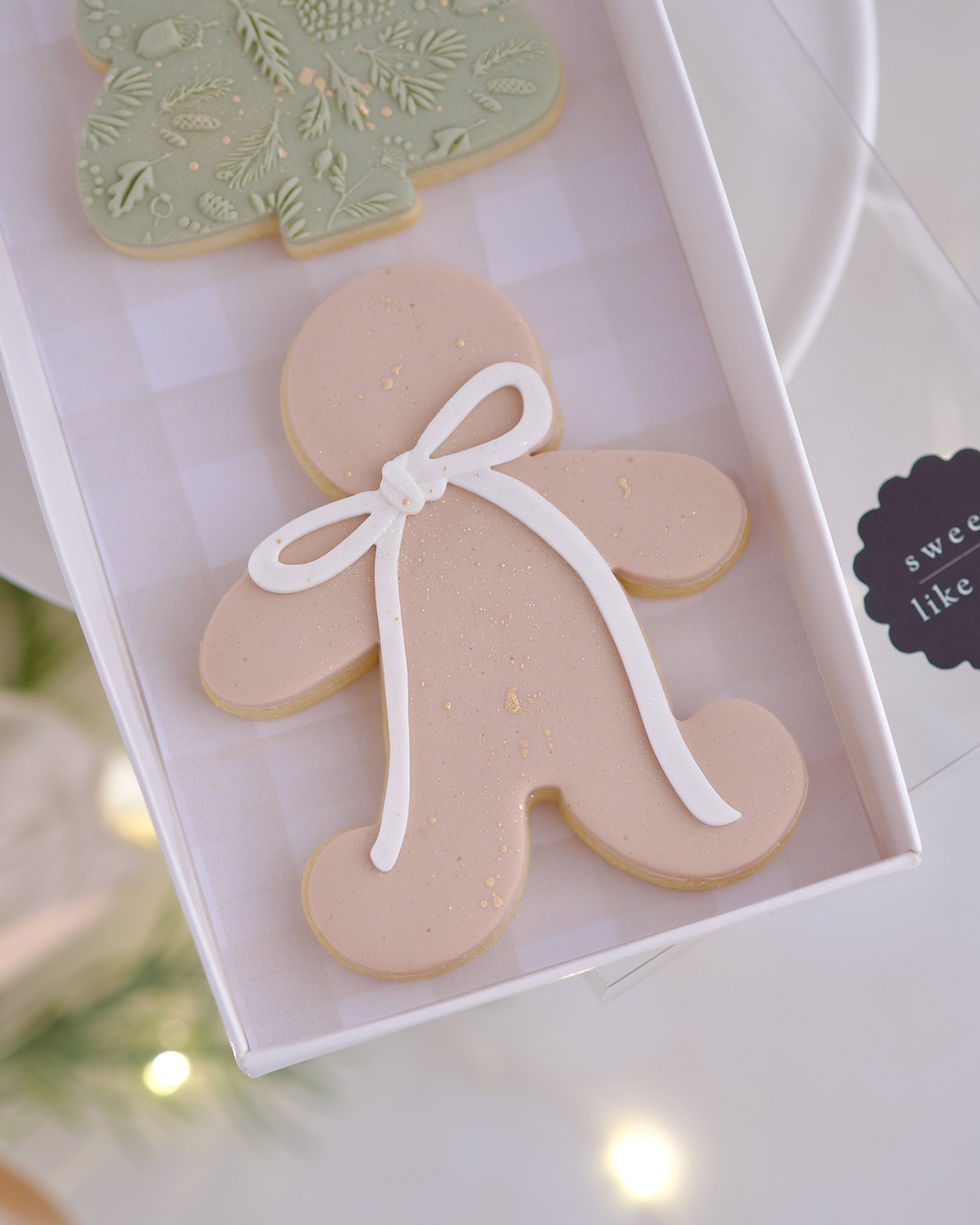close up of gingerbread figure cookie