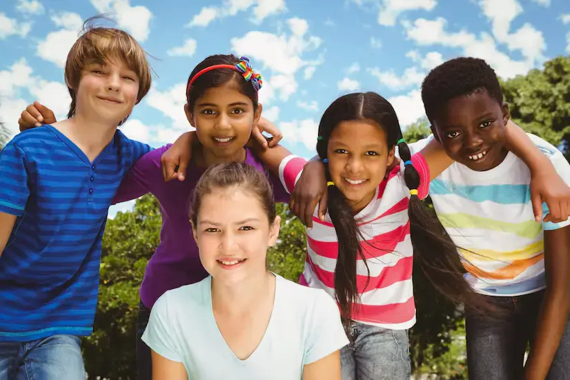 happy-children-forming-huddle-park_13339-300918