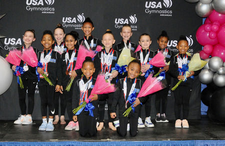 RCG gymnasts pose for a photo.