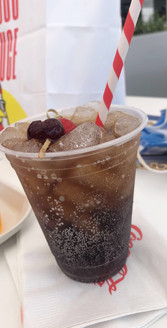 Disney Springs Orlando Florida Coca-Cola Rooftop Beverage Bar Cherry Coke Riper alcoholic drink