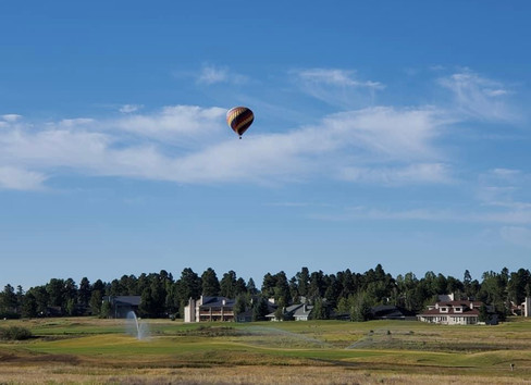 Pagosa Springs Colorado hot air balloon ride off in distance