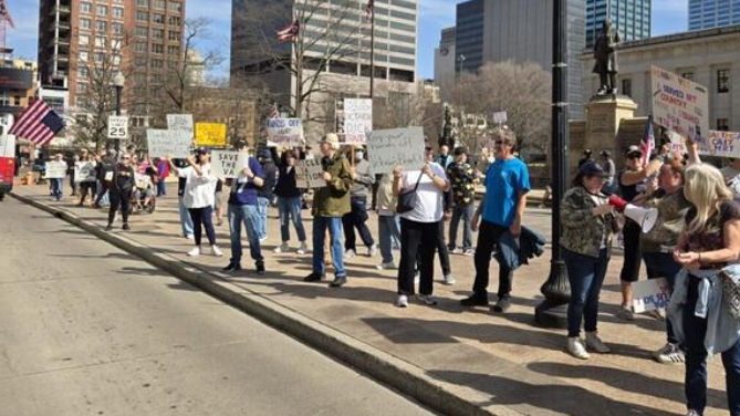 Participants in a veterans' protest of the Trump administration line Third Street outside the Ohio Statehouse. (Photo by Marty Schladen, Ohio Capital Journal)