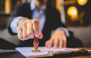 close-up-person-s-hand-stamping-with-approved-stamp-approval-certificate-document-public-p