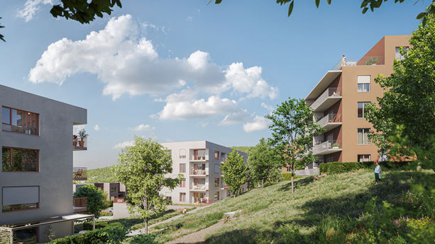 Moderní bytové domy, zelený kopec