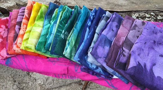 Brightly colored scarves made of 100% cotton