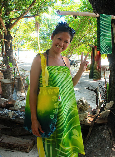 Tote bag and sarong on happy tourist