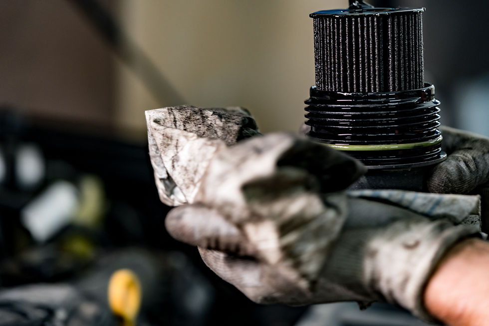 hands-repairman-holding-dirty-car-oil-filter.jpg