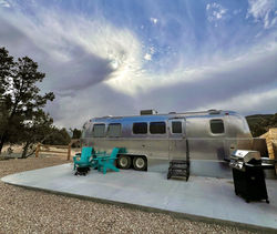 from patio with a grill outside a permanently parked Airstream at East Zion Resort.