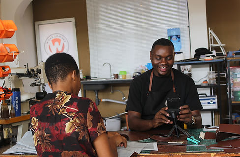 Tow workers working at the leather workshop