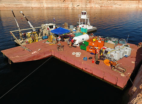 Cross Marine Projects using commercial dive barge for deep water commercial diving operations on Lake Powell to remove fuel from sunk houseboat called Knockers