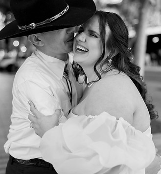 bride and groom laughing