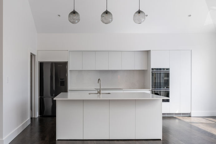 Brand new kitchen featuring an island and finished with matching brushed nickel tapware and accessories