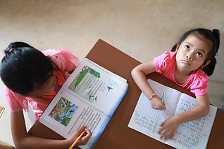 vecteezy_a-cute-asian-girl-doing-homework-in-her-home-during-the-day__777.jfif