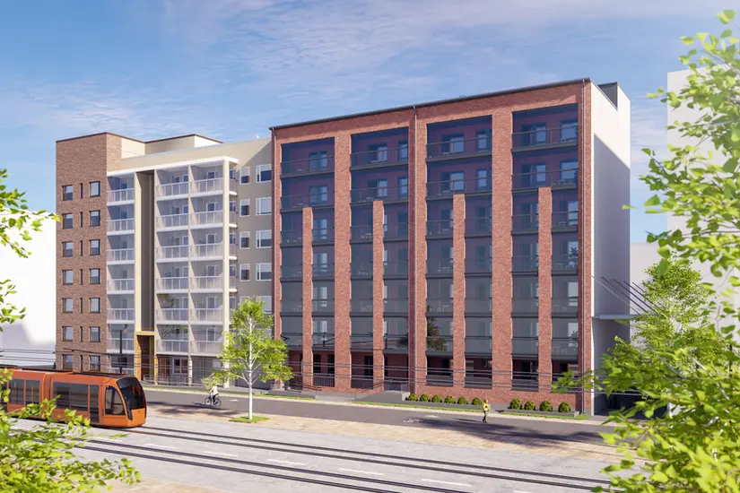 Modern apartment buildings near light rail