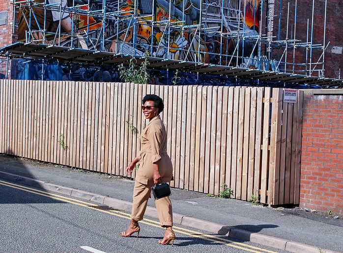 women wearing a jumpsuit walking