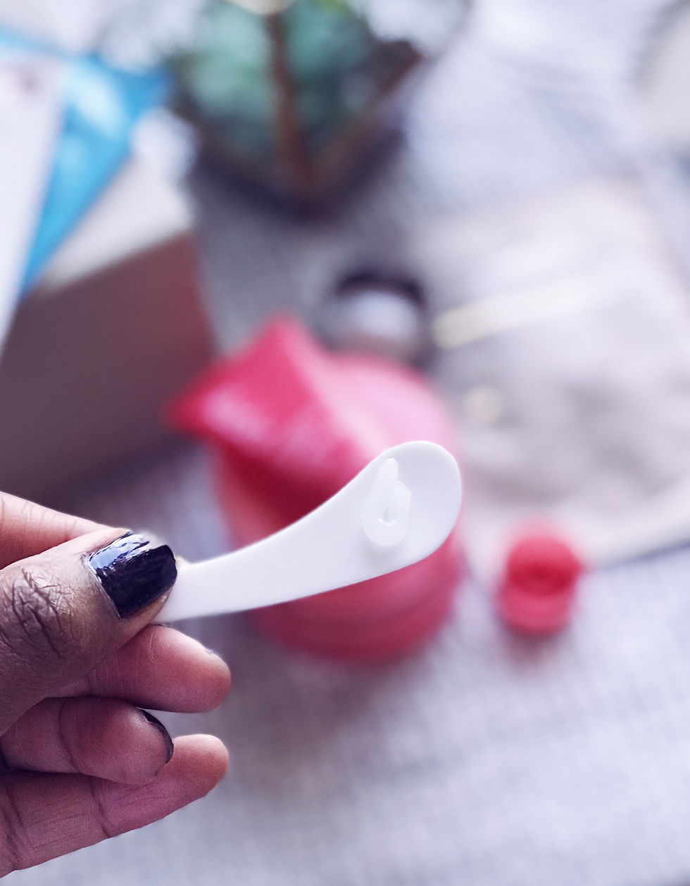 Face cream on spatula