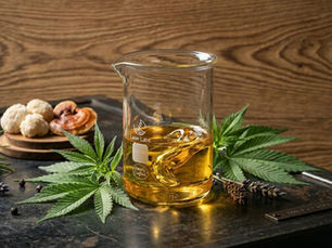 Macro photography of high-clarity CBG distillate in a medical-grade glass beaker surrounded by fresh botanicals.