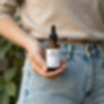 SC Botanicals tincture in hand