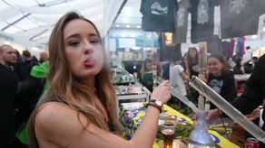 Woman smoking at Cannafest in Saint Paul, MN