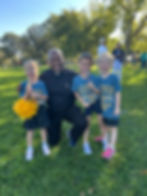 Fr. John with kids.jpeg