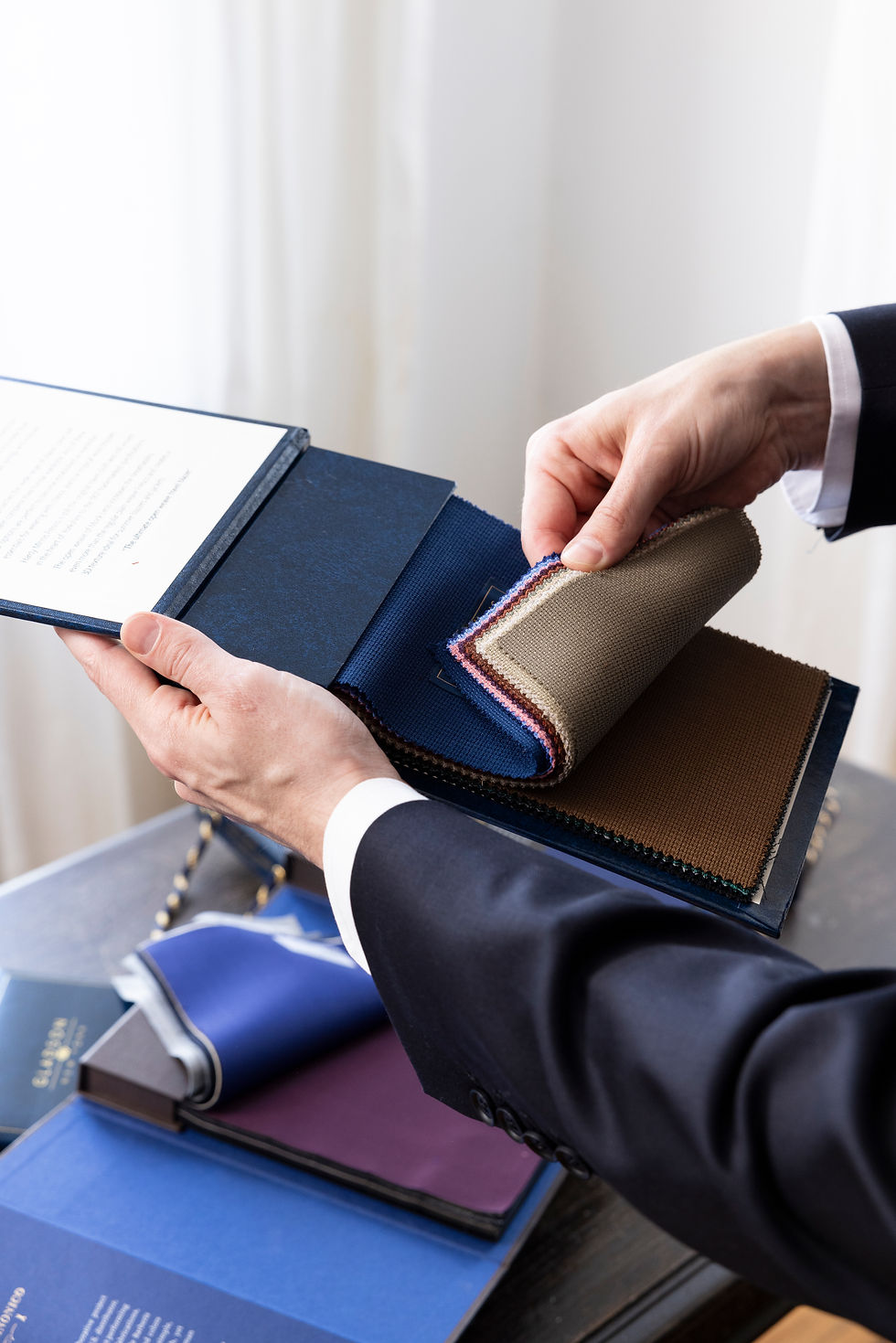 Close-up view of a selection of vibrant fabrics for custom clothing