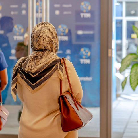 Guests entering a modern event venue