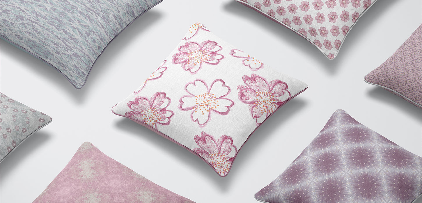 Collection of hand-drawn and textured floral cushion mockups in blush and lilac tones from the Whispering Petals collection by UK surface pattern designer Jo Phillips. Perfect for home interiors and soft furnishing design licensing.