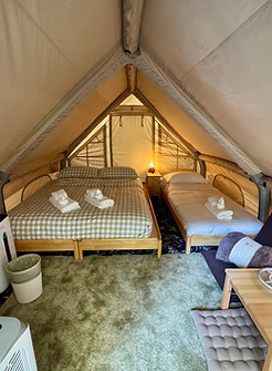 The magical bedroom — a warm and inviting 3×4 m sanctuary (12 sq.m.) embraced by nature. Found in our Cozy, Serene, and Fami