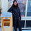 Thumbnail: Women wearing Black Diamond Belay Parka in color black. front view