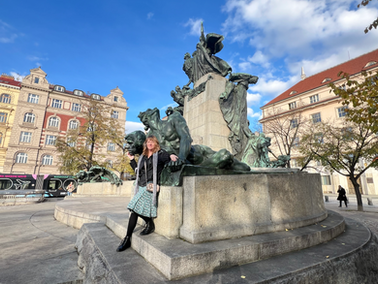 Our last evening in Prague — bundled up under the glowing streetlights near the Charles Bridge.