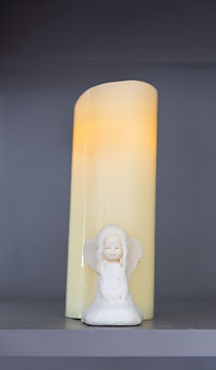 angel and candle in the treatment room of shanagarry holistic reflexology east cork