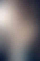 fluffing bride's dress