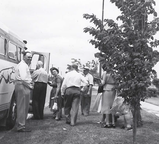 NIPCO Director Dennis Lindberg accompanies participants on a tour to a hydro-electric dam circa 1959