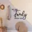 Miniaturbild: Personalisierbarer Schriftzug aus Holz - we are Family -
