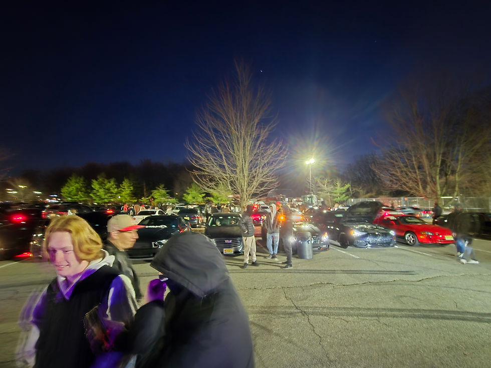 High angle view of a crowded New Jersey car meet with diverse vehicles and enthusiastic attendees