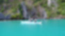 Friends on a boat in Philippines' turquoise waters