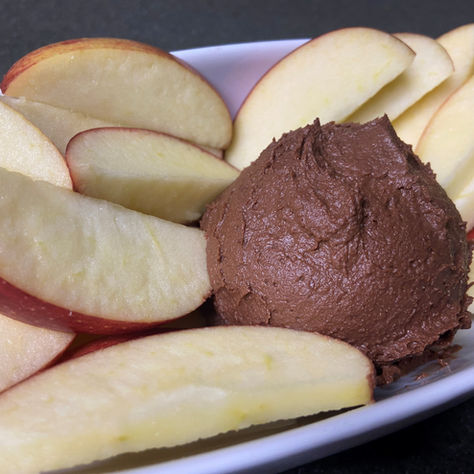 Chocolate Hummus with Apple Slices in a White Porcelain Dish