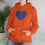 Thumbnail: Cozy Heart Patterned Hoodie for Comfort and Style - #HeartsInMotion