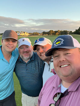 Trey Hinson is pictured playing golf with sales brokers.