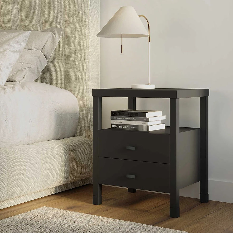 Eye-level view of a stylish nightstand with a lamp and decorative items