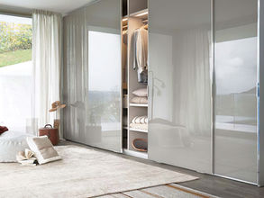 Custom design modern closet with glass sliding doors