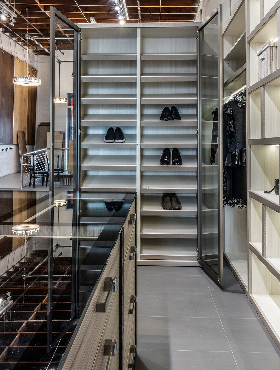 VelArt custom design closet system with angled shoe storage cabinets