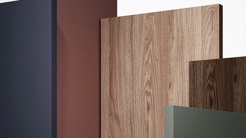 Wood and colored panels in various shades and textures stand vertically against a plain white background, creating a minimalist aesthetic.