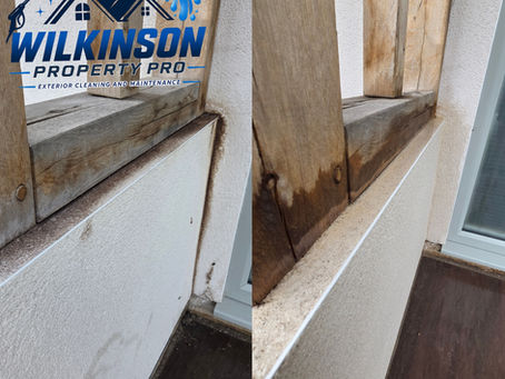 Close-up view of white render wall after stain removal in Long Eaton