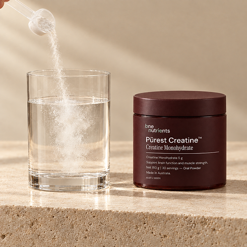 bne Purest Creatine Monhydrate tub and glass of water on bench