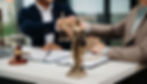 male-lawyer-in-the-office-with-brass-scale-on-wood-2026-01-09-11-59-33-utc.jpg