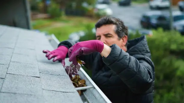 Maintaining gutters and downspouts
