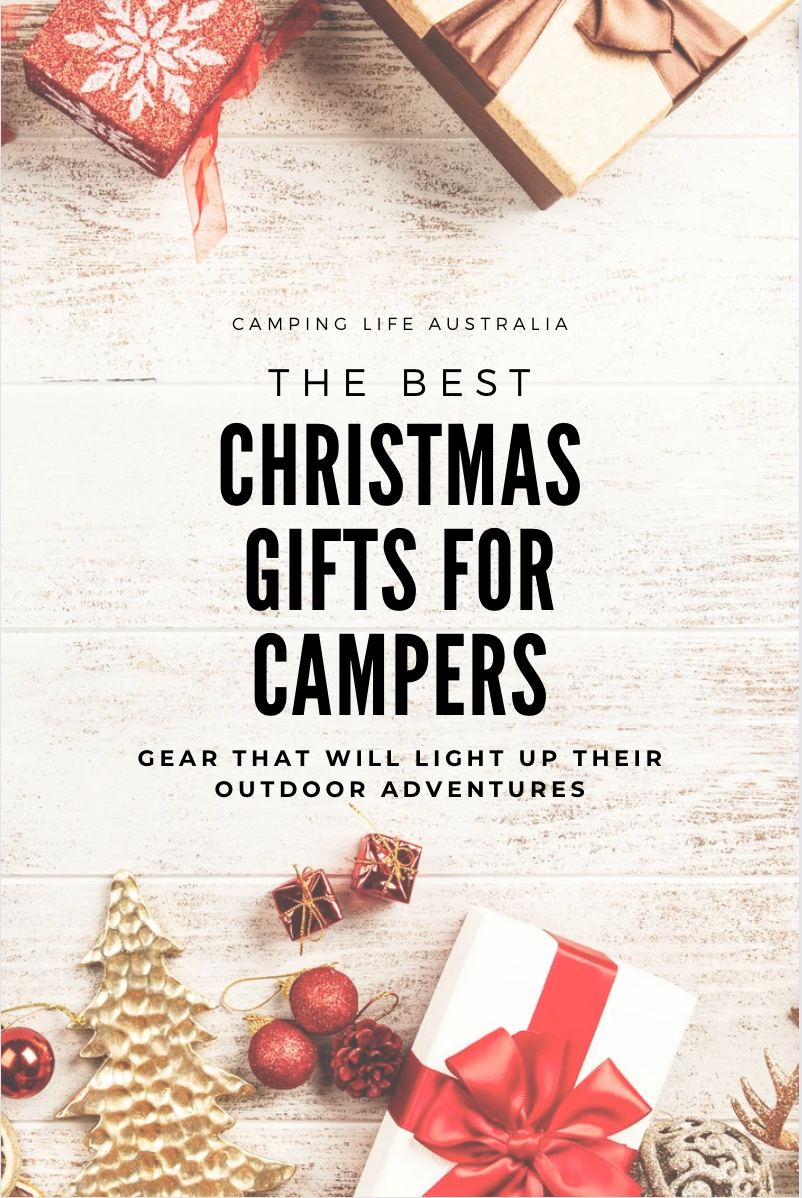 light wooden background with wrapped presents on it with "the best Christmas gifts for campers" in the middle