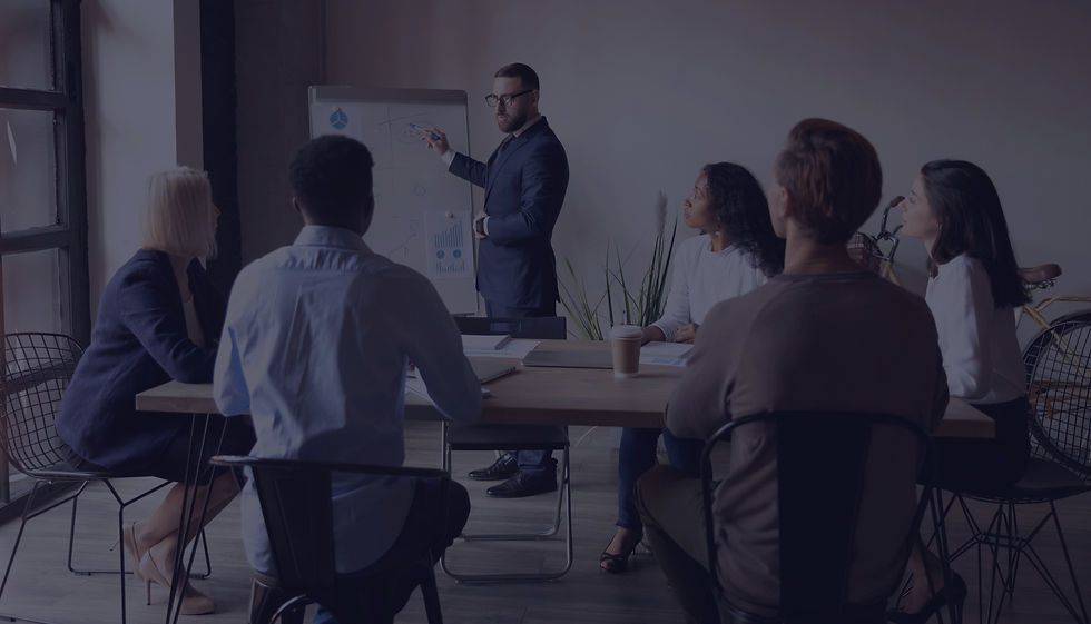 Professional accountants analyzing financial reports and data, representing DnA CPA’s and Advisors’ expert tax, bookkeeping, and advisory services for individuals and businesses across the U.S.