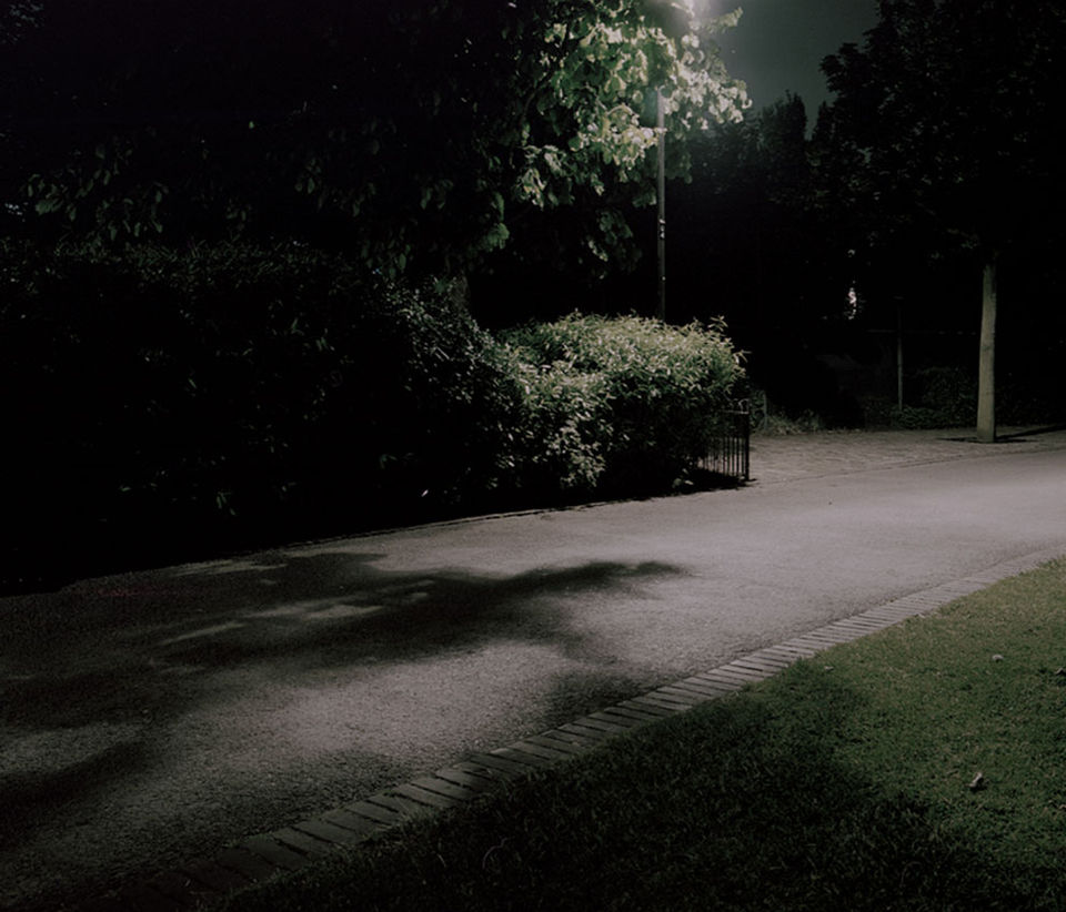 “Urban Darkness” aims to reconceptualize darkness in the cityscape at night. The work forms part of Chantal Meng’s dissertation, Light at Night: What is the Matter with Darkness? This practice-based research, comprising photography and drawing as notational media, explores how artificial light impacts –– and even causes –– darkness in the urban night. The photographs draw parallels to our visual and spatial understanding of image, light, and shadow. Night Drawing events, and the practice of drawing itself, focus on embodied experiences and unseen aspects of nocturnal atmospheres that go beyond visual representation.
